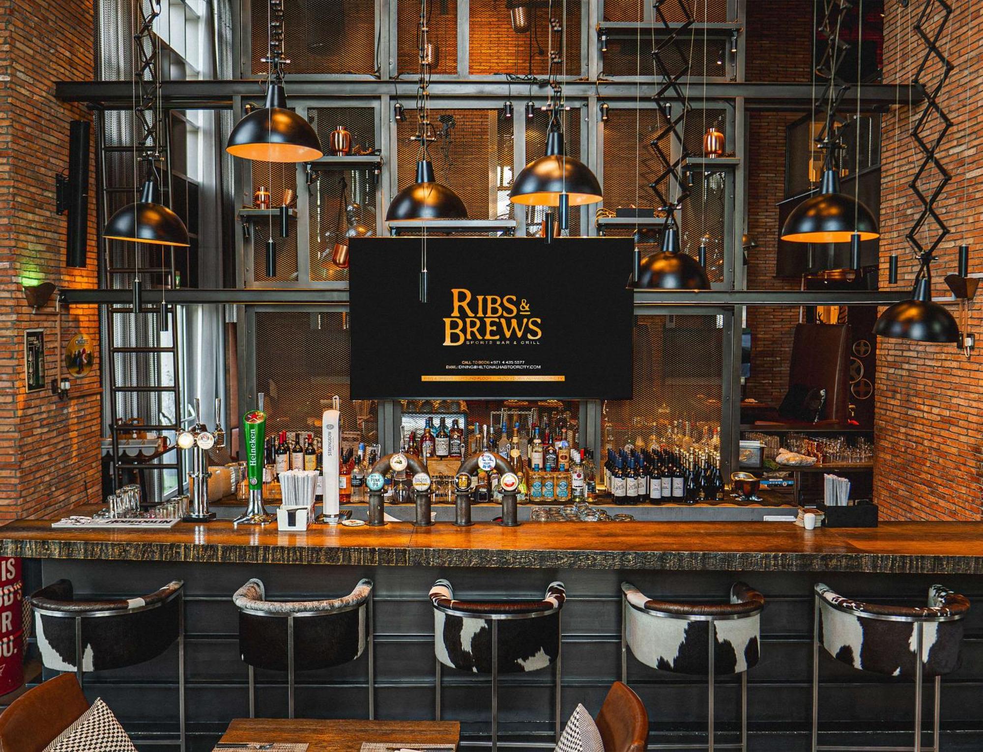 Hilton Dubai Al Habtoor City Exterior photo Ribs & Brew's bar